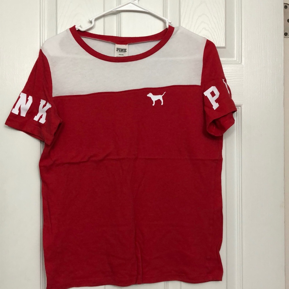 PINK victoria secret t-shirt with the words “PINK” on sleeve